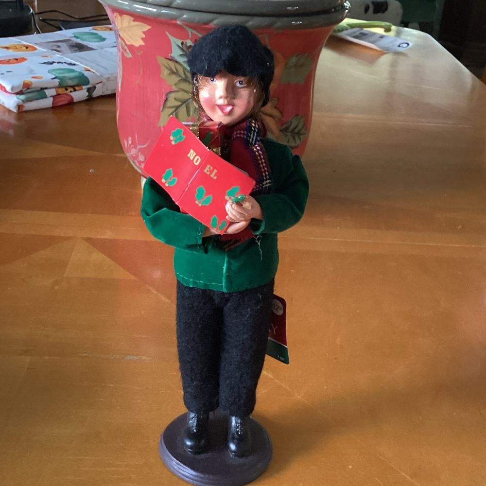 Festive  Christmas Caroler Figurine with Green Jacket